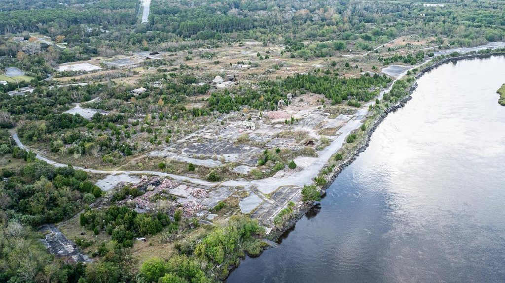 An aerial view of a river and some trees