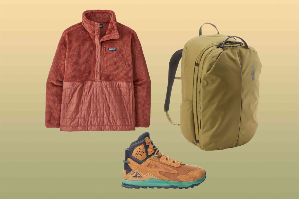 A brown jacket, backpack and boots on a green background