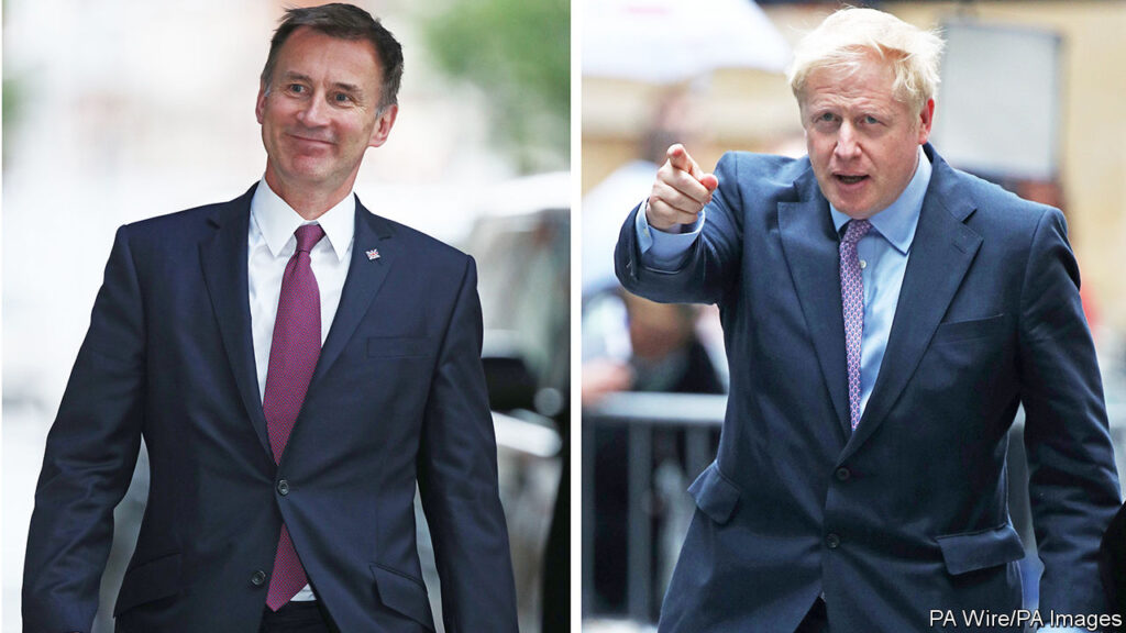 Two men in suits and ties walking on a sidewalk.