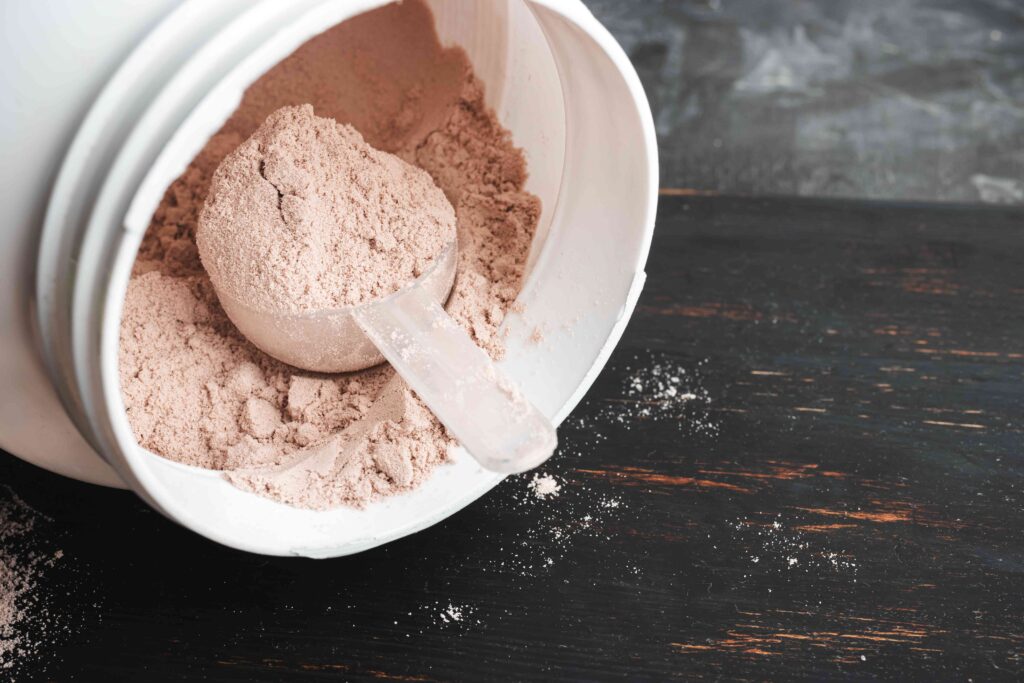 A bowl of powdered milk on top of a table.