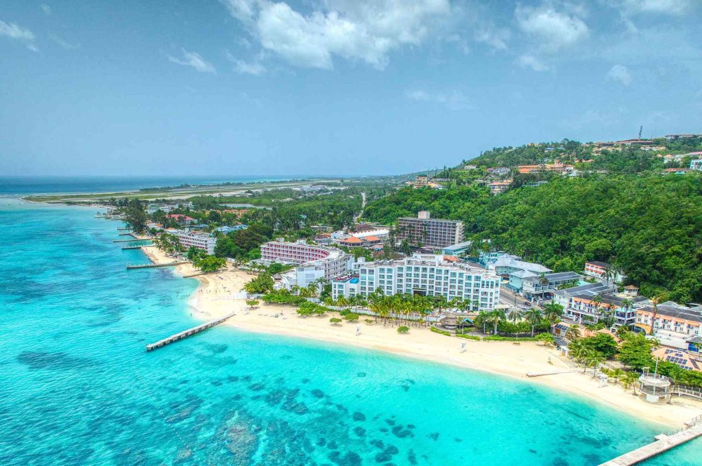 A view of the beach and resort from above.