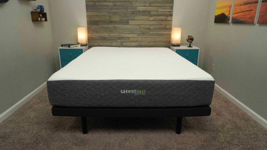 A bed with a mattress on top of it.