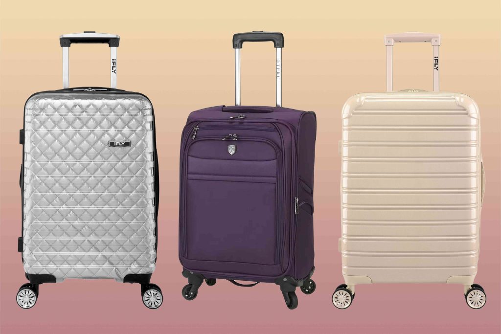 A group of three suitcases sitting on top of each other.