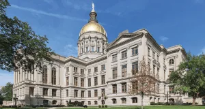 A large building with a golden dome on top of it.