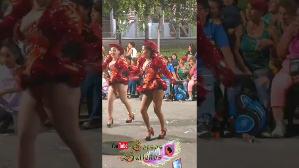 Dancers performing in colorful costumes at parade.