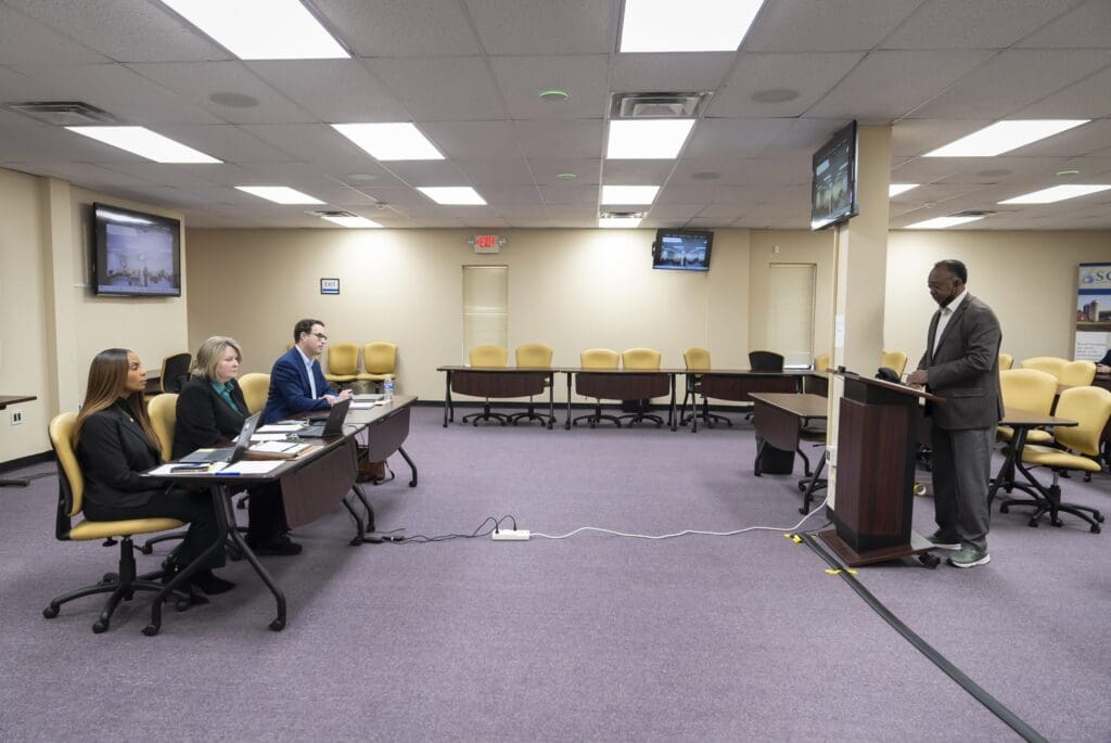 Firm running Georgia’s struggling Medicaid experiment was also paid millions to sell it to public