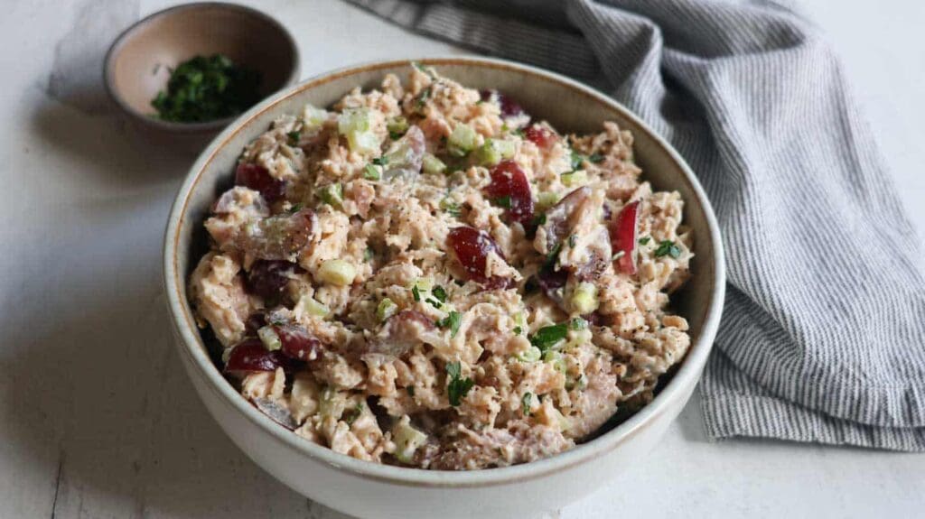 Chicken salad with grapes in a bowl.