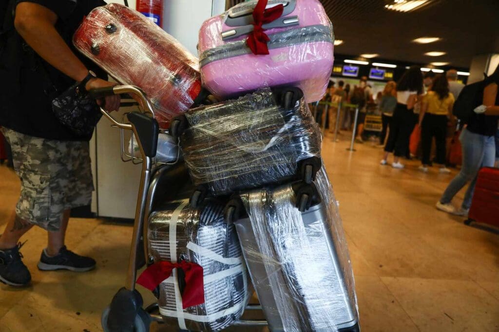 Does Wrapping Your Baggage Make It Extra Safe? TSA Weighs In Foil wrapped luggage are seen at the Barajas Airport in Madrid