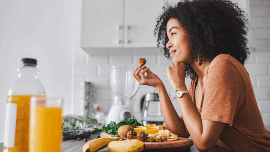Young woman eating a healthy breakfast
