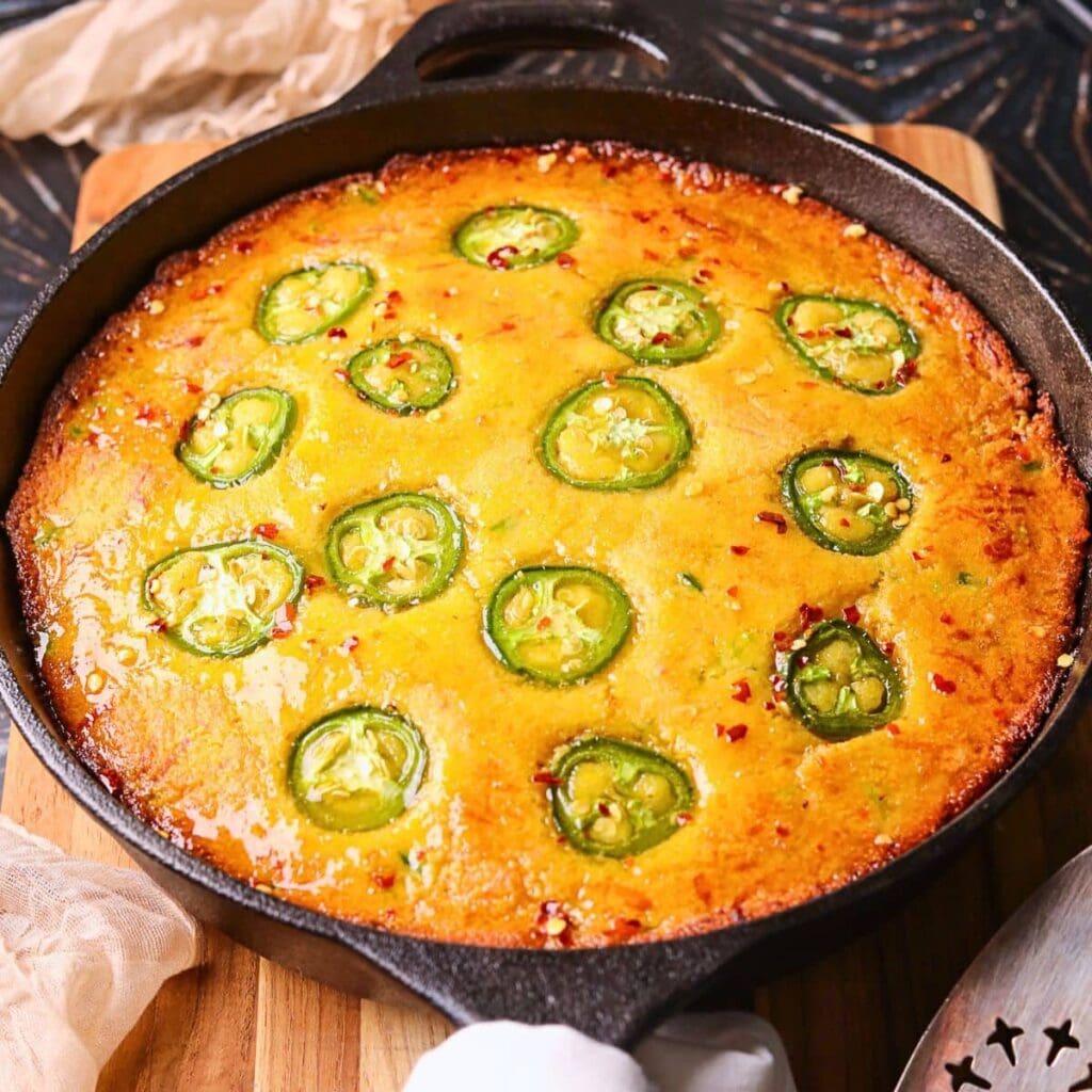 Jalapeño cheddar cornbread with spicy honey butter fresh out of the oven.