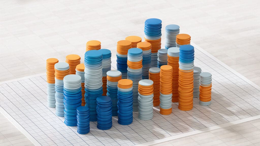 Stacks of colored chips on graph paper.