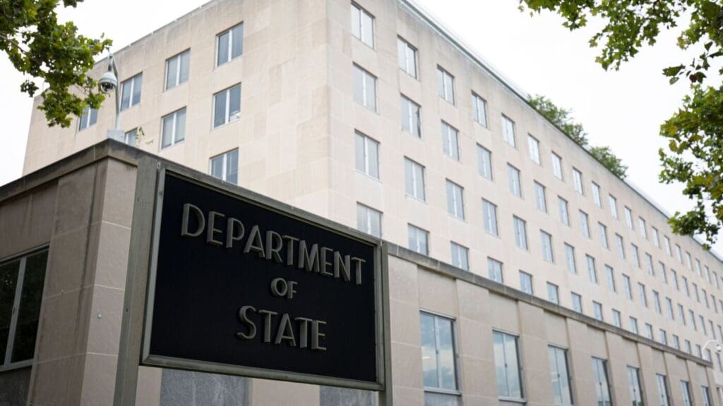 Department of State building exterior with sign.