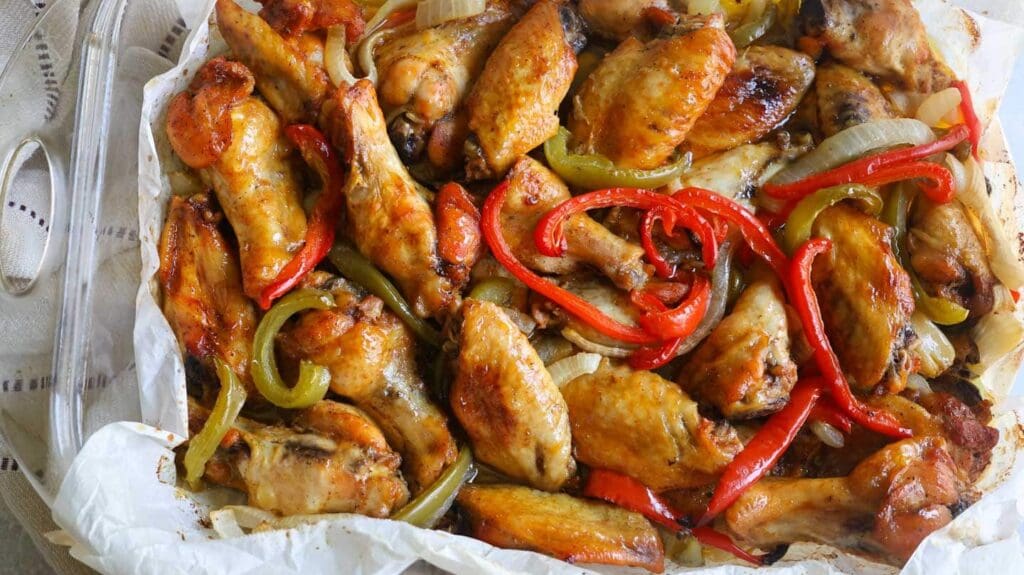 Caramelized chicken wings with onions and peppers