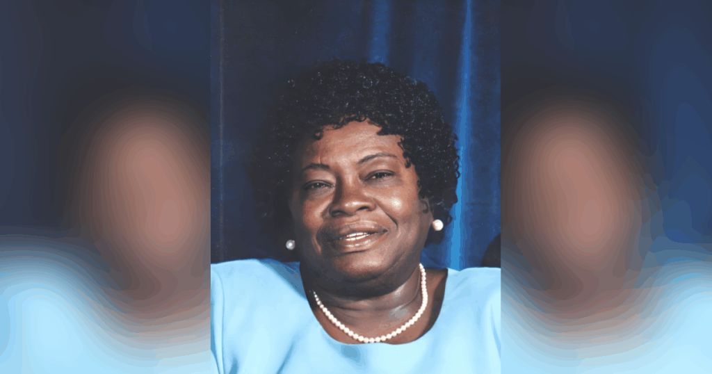 Obituary for Dorothy Paynter | B.F Cave Funeral Home Smiling woman in blue with pearl necklace.