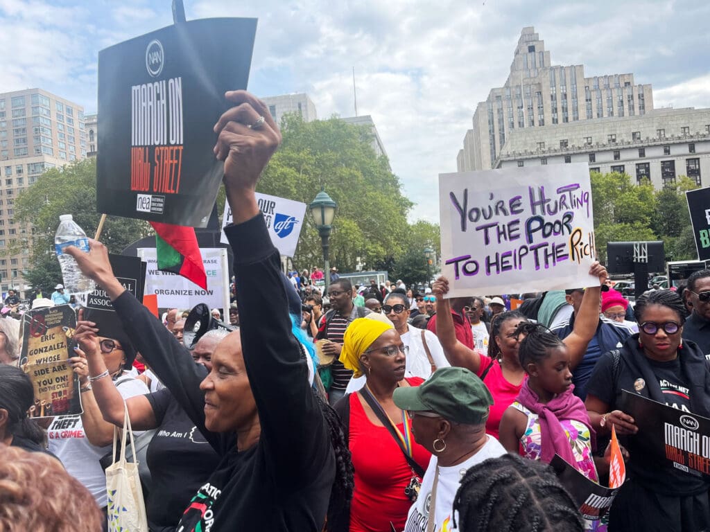 Black faith leaders march on Wall Street to denounce anti-DEI campaign