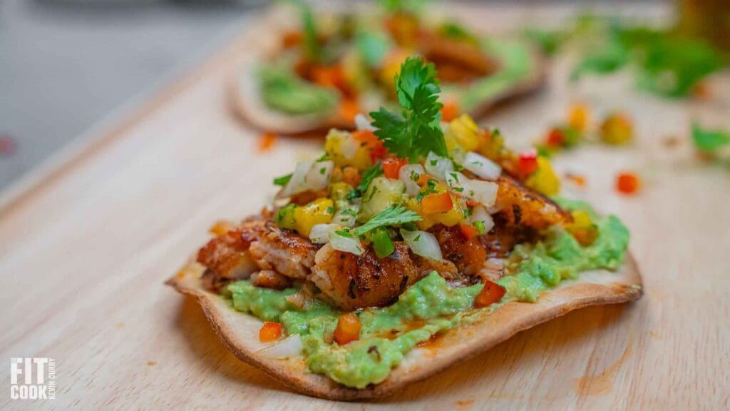 Grilled chicken tostadas with guacamole and salsa.