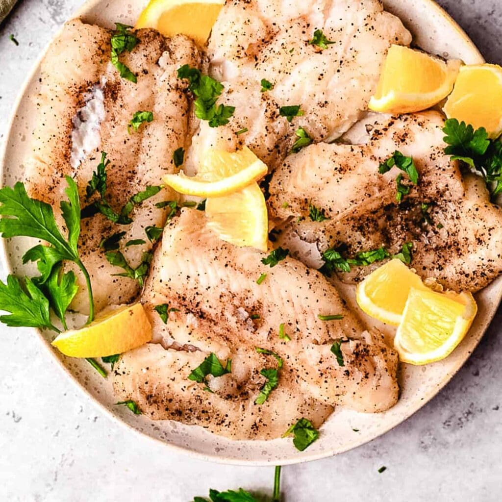 Instant pot fish with lemon on the plate