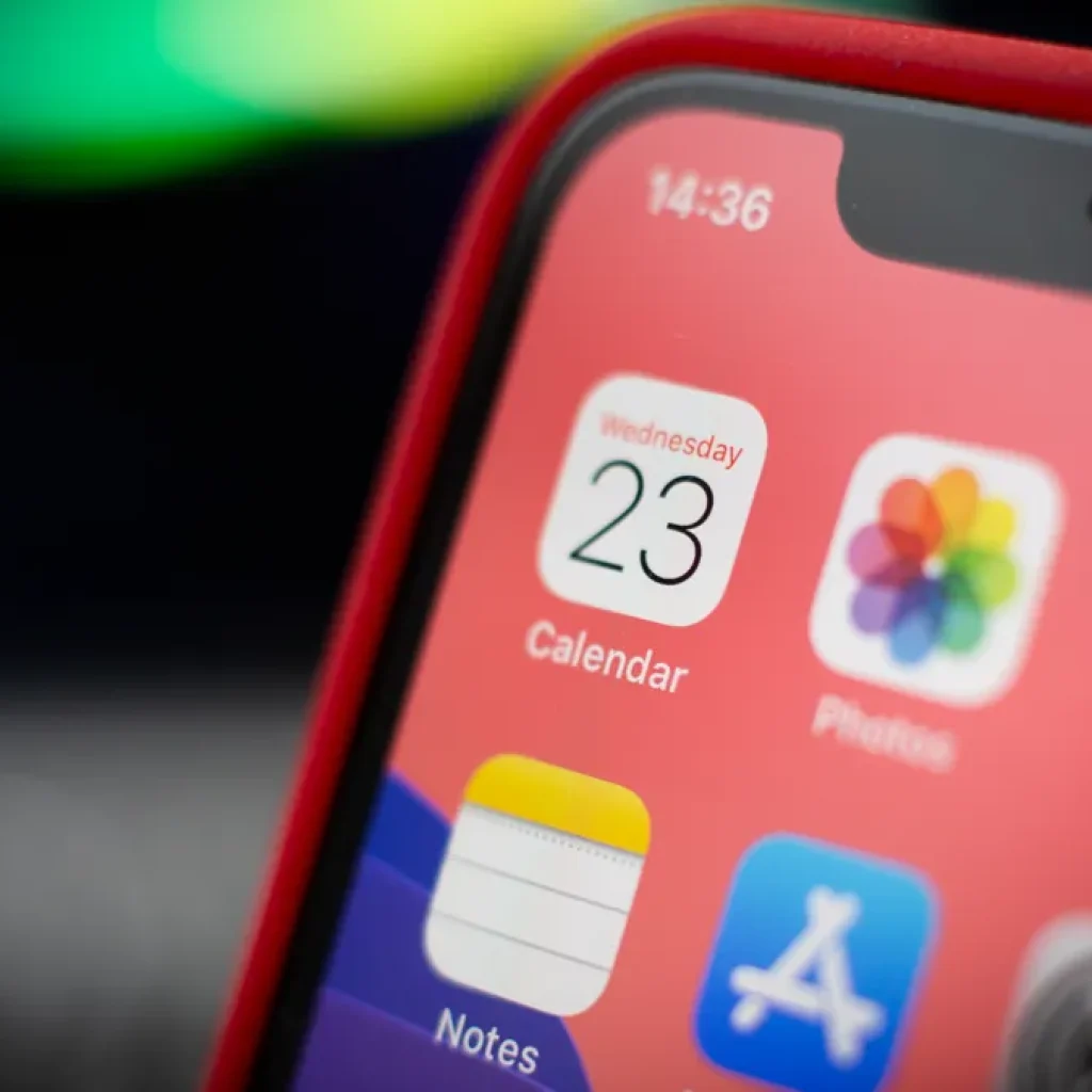 An iPhone showing app icons on the home screen.