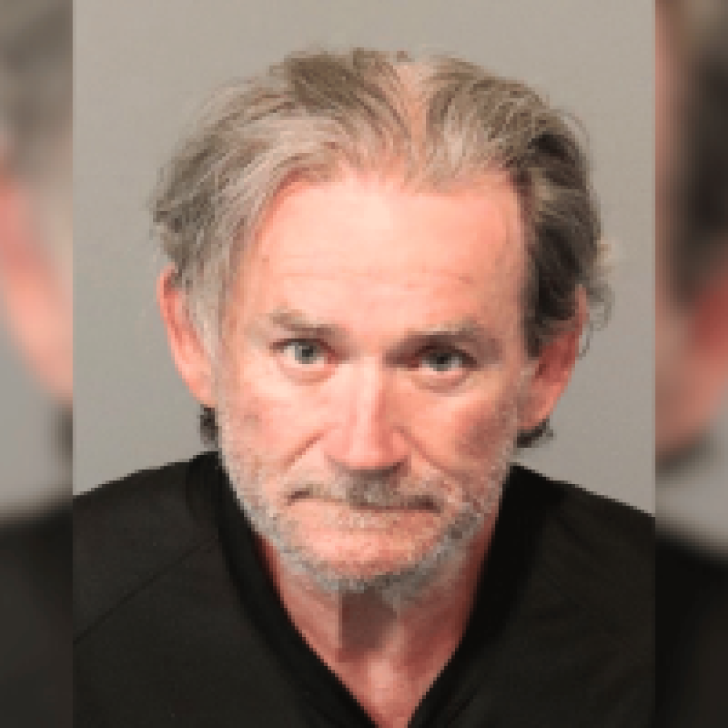 Nevada man sentenced after stealing $714K from multiple Dotty’s Casino locations. Mugshot of an older man with gray hair and light stubble, wearing a black shirt against a neutral background.