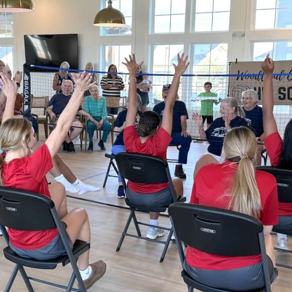 High Schoolers and Seniors Build Unlikely Friendships Through Chair Volleyball