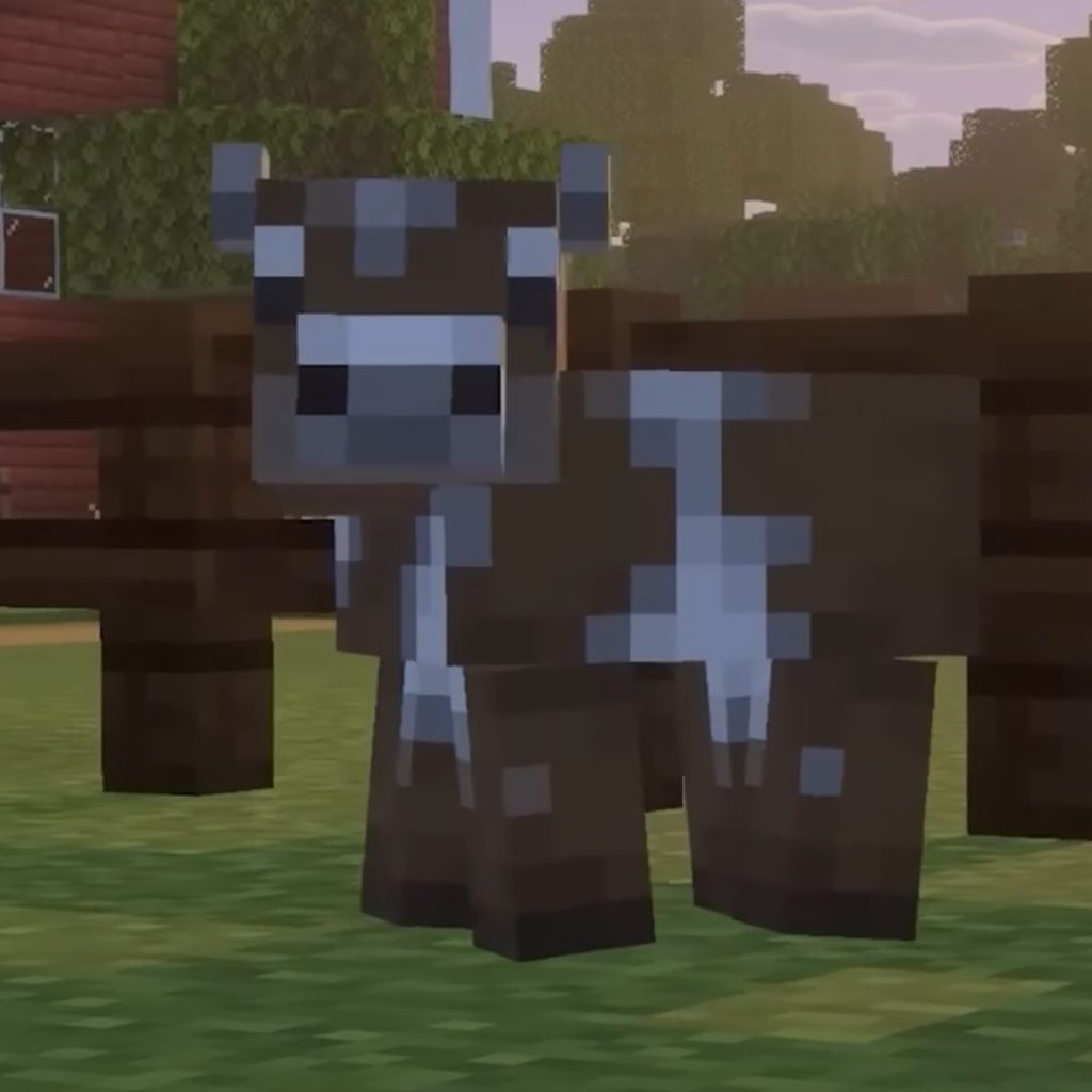 Mojang hired a “cow whisperer” and “real animal voice actors” to record new Minecraft animal noises: “The cows started to speak to him immediately” Pixelated cow looks toward camera in Minecraft