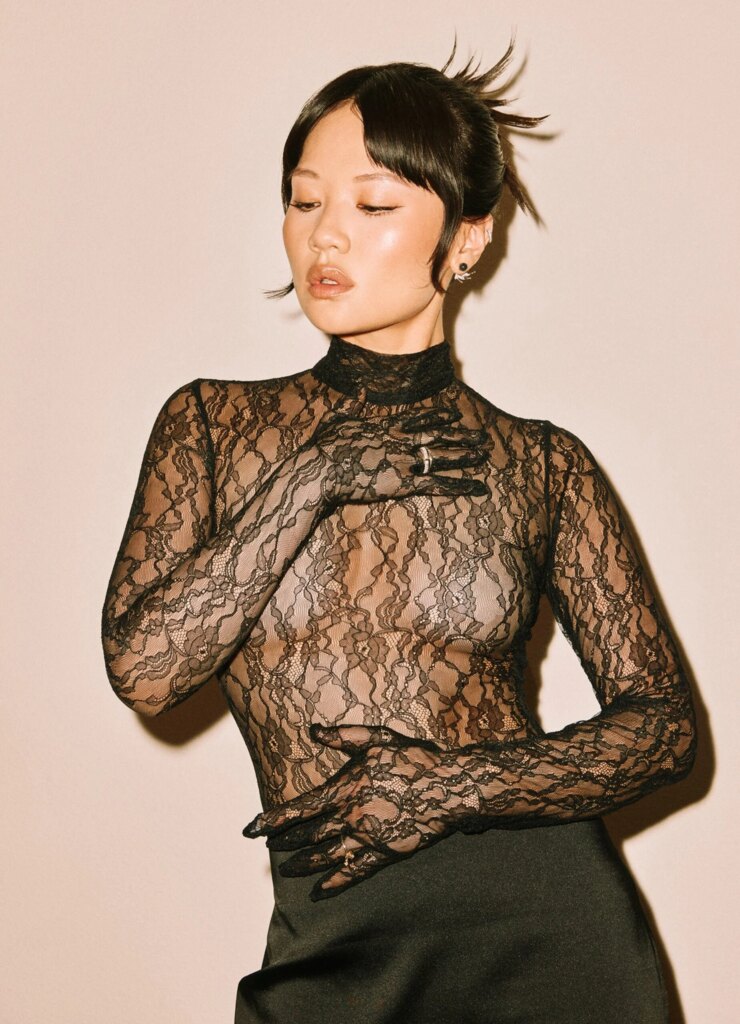 Rei Ami updo hairstyle for pre-Oscars dinner with textured knots and soft face framing pieces.