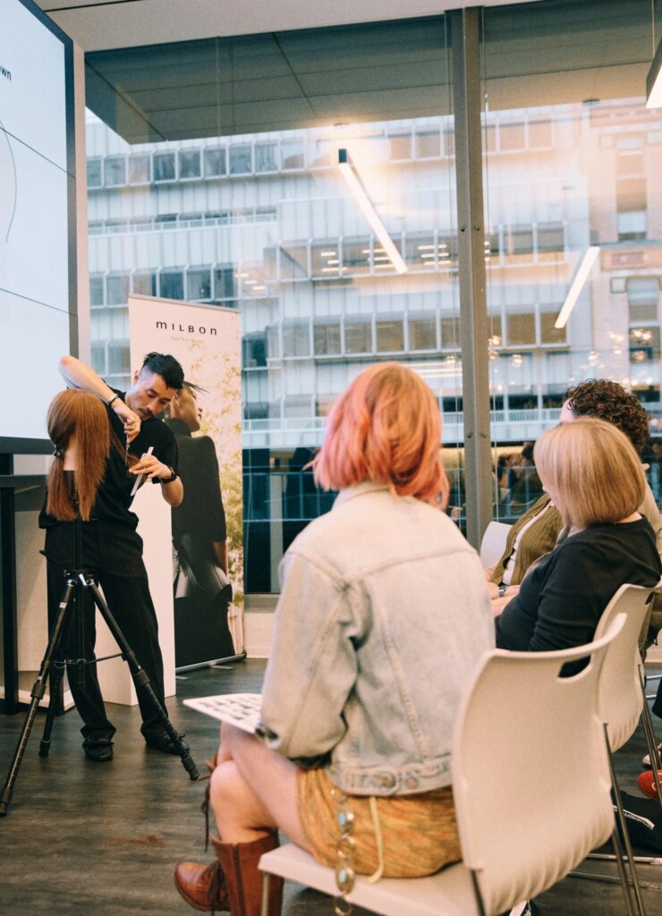 Which Curated Cutting Class Is Right for You? Professional hairstylists attending a Curated Cutting education class instructed by Anh Co Tran