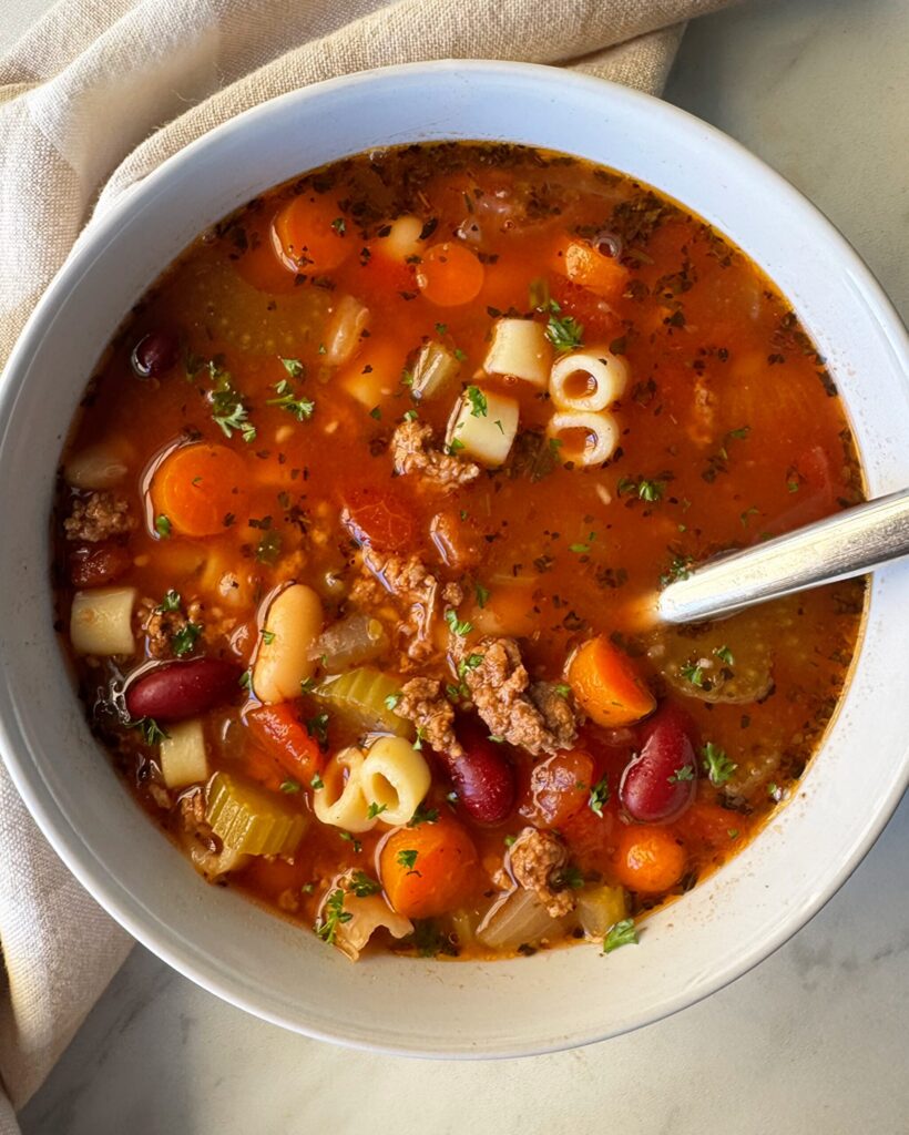overhead shot of Pasta e Fagioli in white bowl