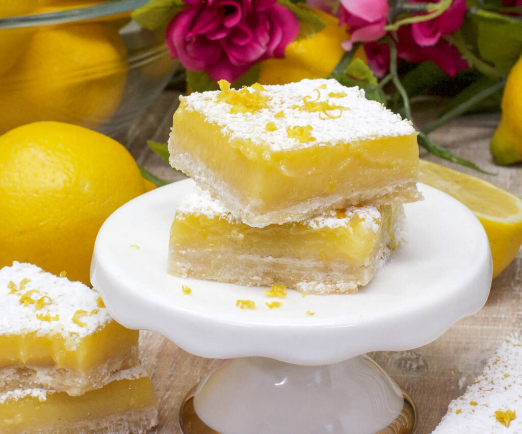 lemon bars stacked on platter