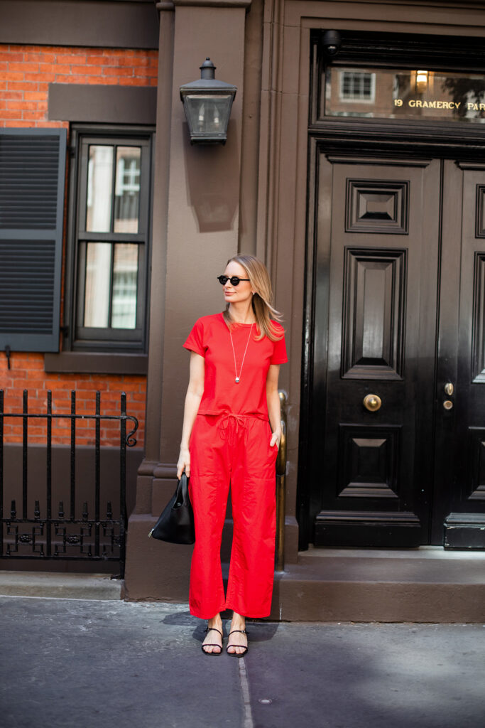CASUAL PANTS THAT WILL KEEP YOU COOL THIS SUMMER (IN MORE WAYS THAN ONE) MERRITT BECK IN LESET KYOTO CARPENTER PANTS AND T-SHIRT IN CHERRY RED