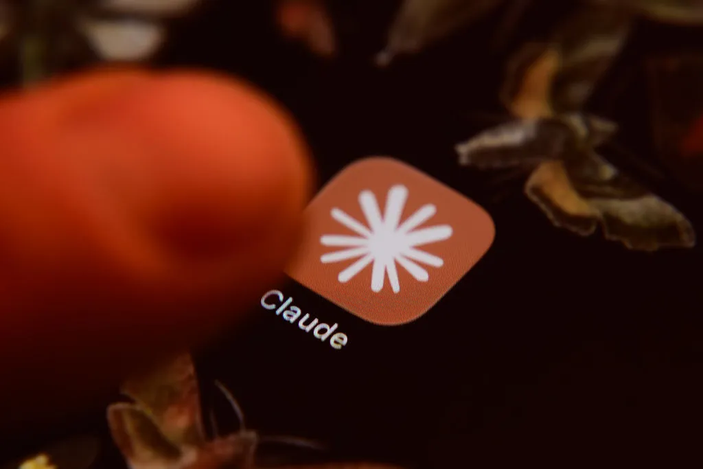 Anthropic starts localizing Claude pricing for India, its biggest market after the US The Claude app icon is displayed on a smartphone screen