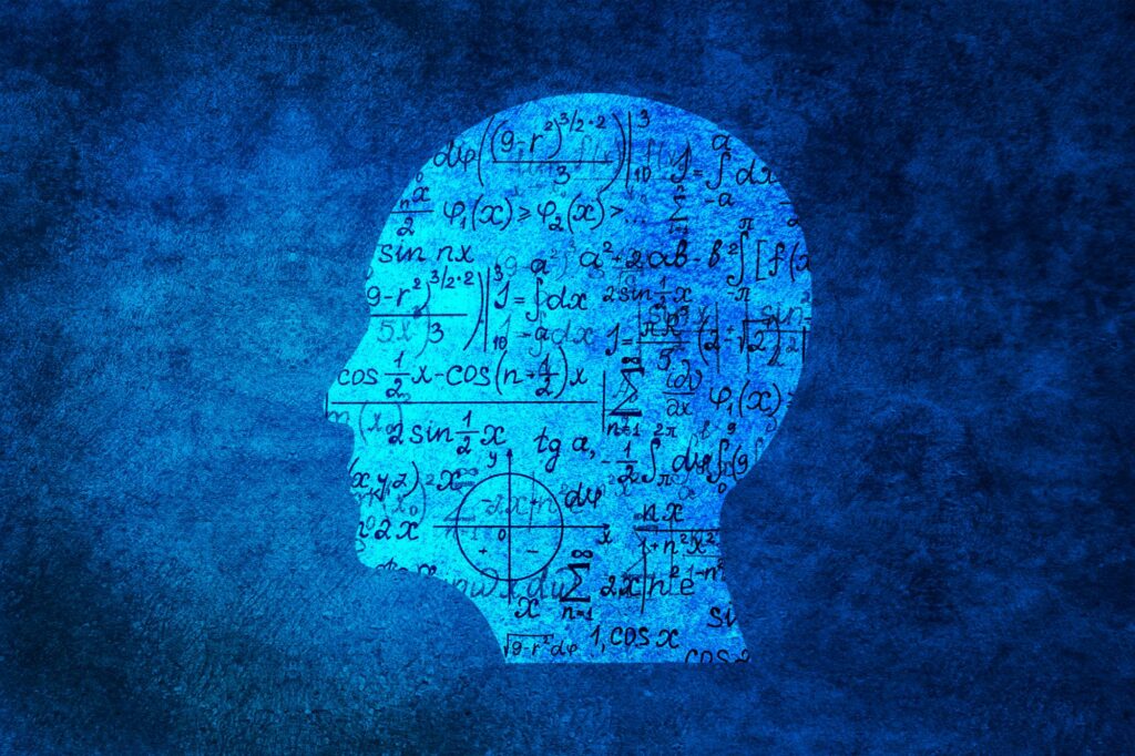 ‘Cognitive Surrender’: Faster Solutions, Lower Test Scores Show How AI is Eroding Math Skills Human head with mathematical seamless pattern on abstract blue wall background