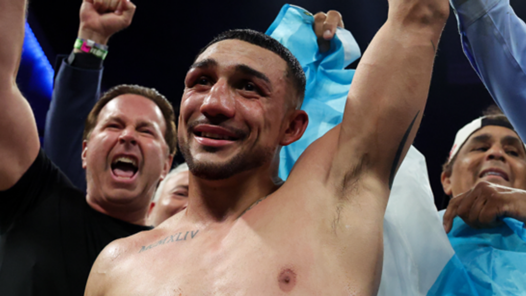 Teofimo Lopez celebrates his win over Rolly Romero to claim the WBA welterwight title