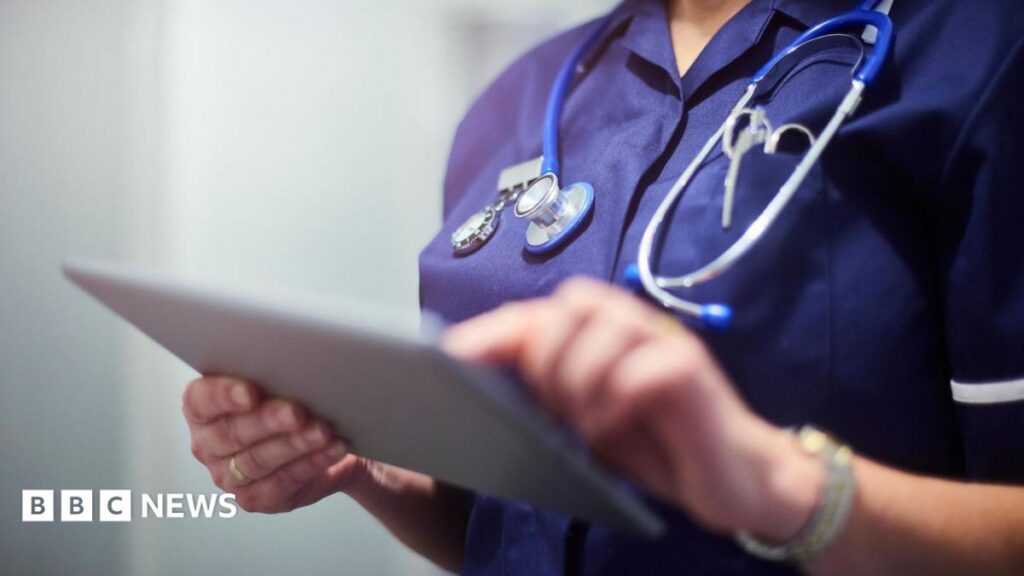 NHS staff suspected of snooping on patient data to face immediate suspension Stock image of a nurse holding a tablet computer presumably containing medical records.