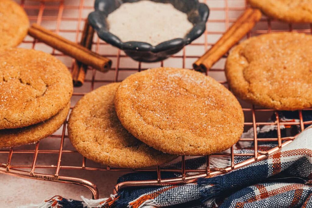 Brown Butter Chai Snickerdoodles – A Classic Twist brown butter chai snickerdoodle cookies on a cookie rack