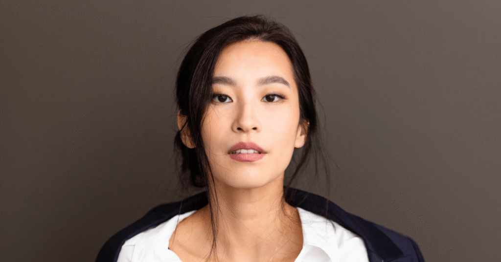 Beneath the Smile: Amanda Zhou Finds the Humanity in Joo Dee Beneath the Smile: Amanda Zhou Finds the Humanity in Joo Dee