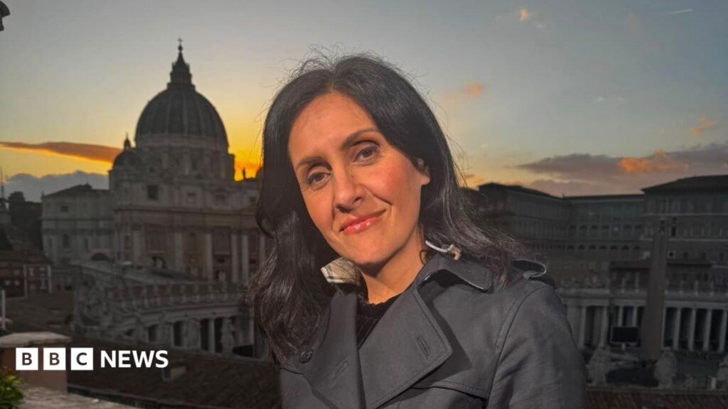 Maryam Moshiri: BBC News presenter reveals she has blood cancer Maryam Moshiri stand in a black coat. The Vatican is in the background