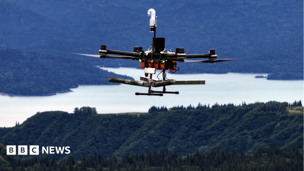 Rainmakers: Will drones make cloud seeding more effective? A Rainmaker drone flies over forests and a lake in Alaska.
